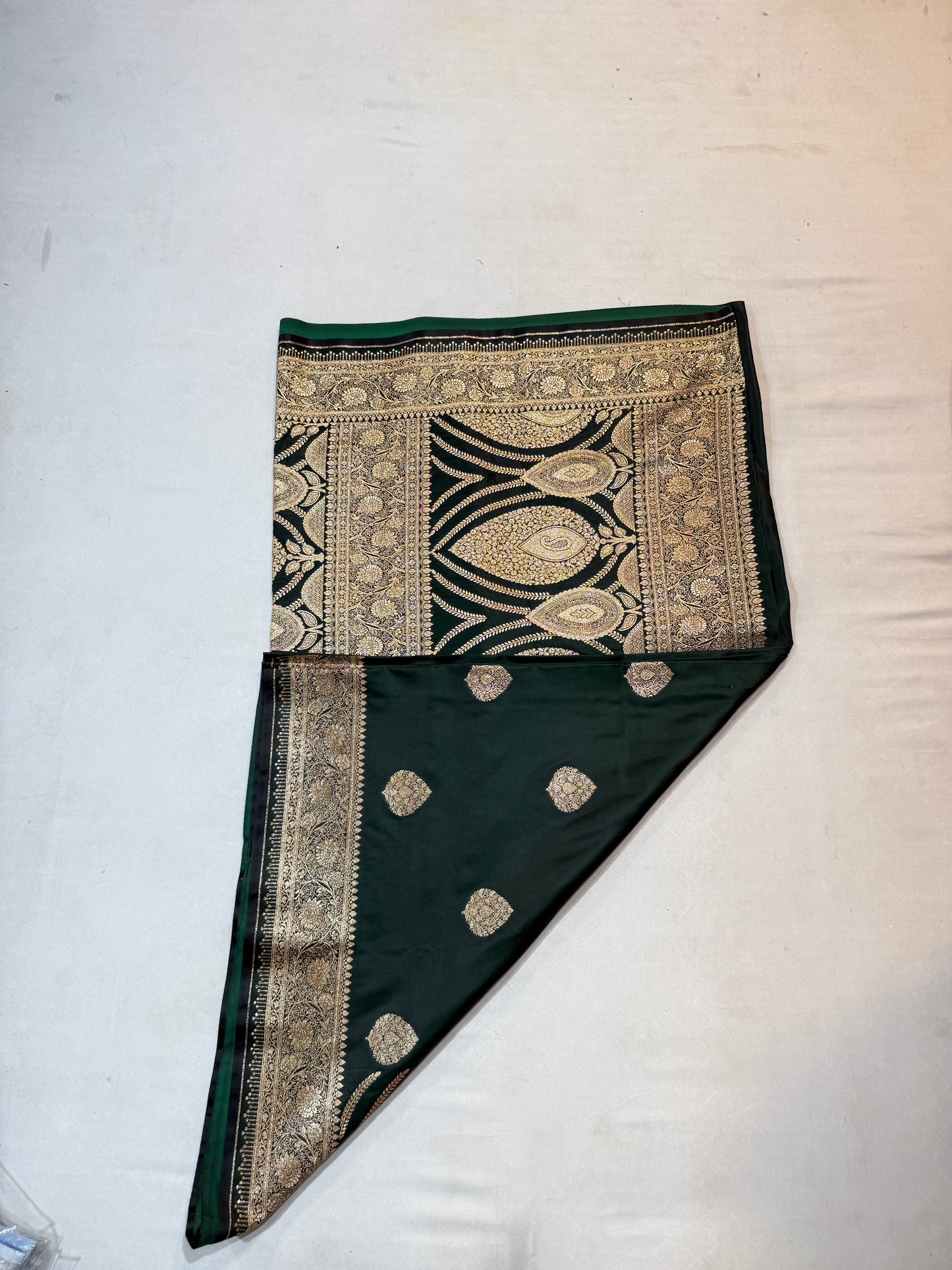 bottle green mashru silk saree with banarasi zari paisley motifs and ornate floral border
