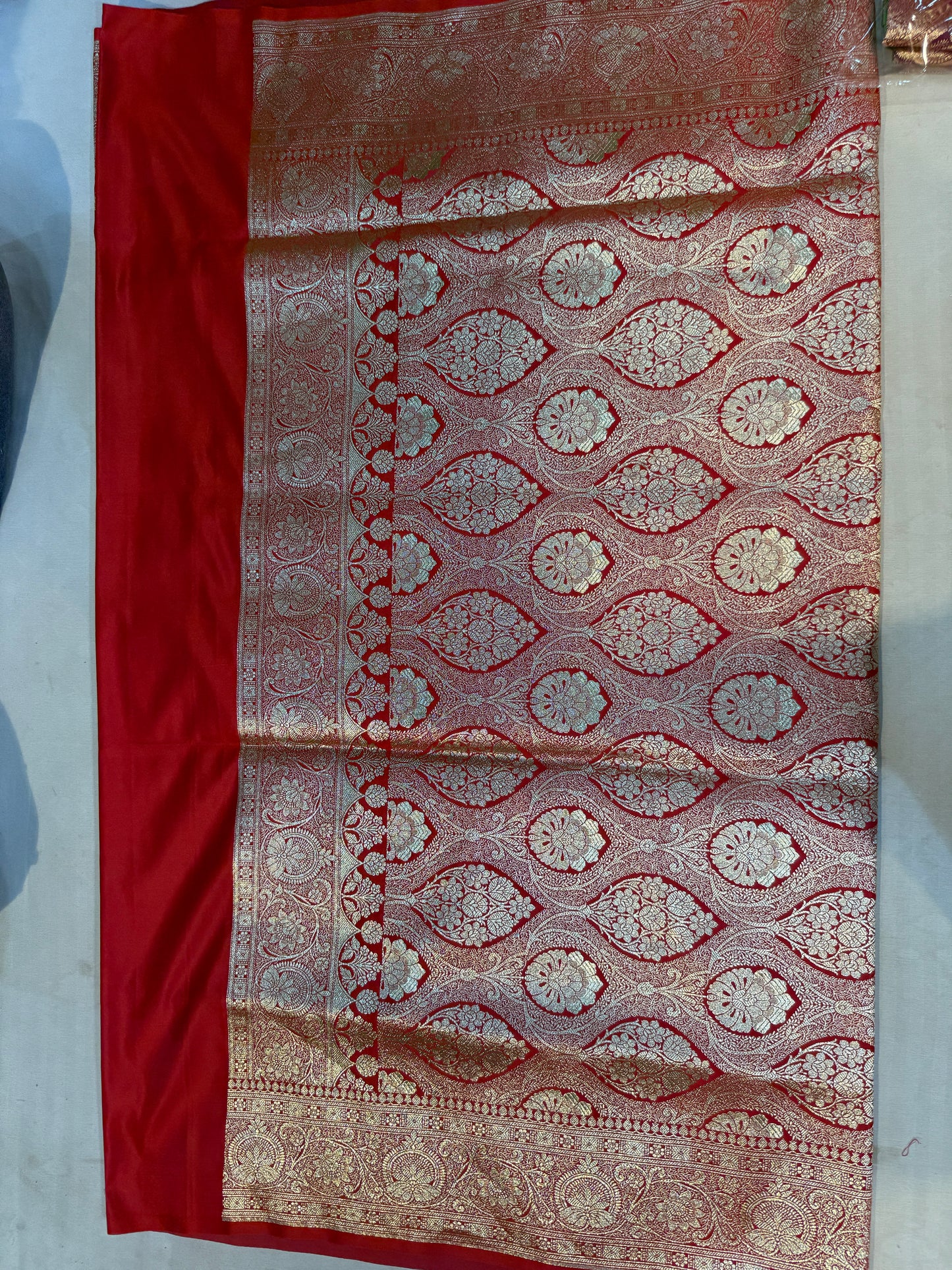 crimson red mashru silk saree with banarasi floral zari work & ornate border