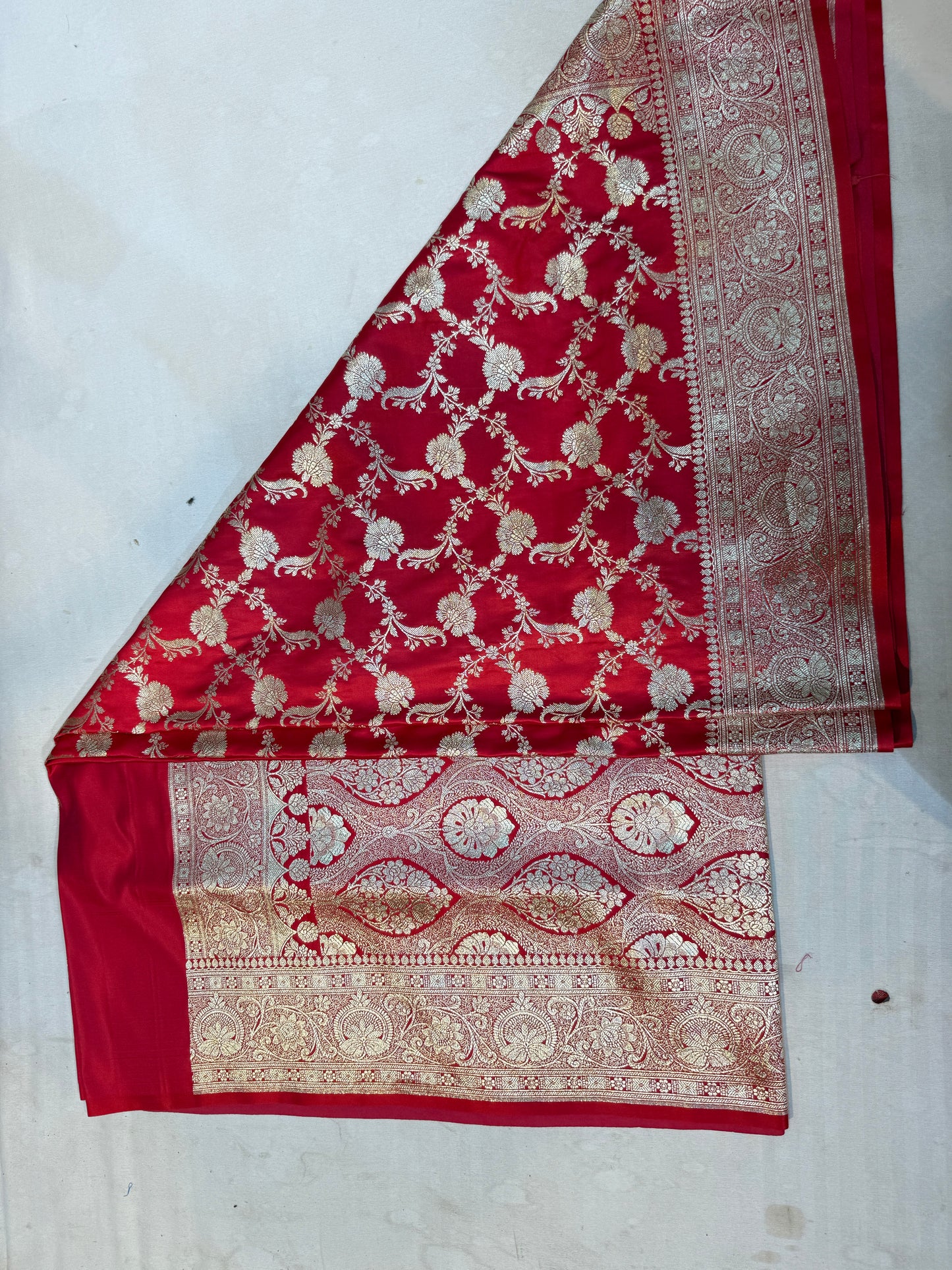 crimson red mashru silk saree with banarasi floral zari work & ornate border