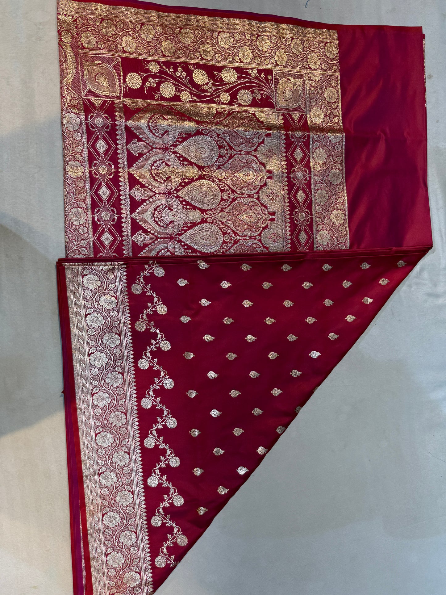 regal red katan silk saree with majestic gold zari paisley border