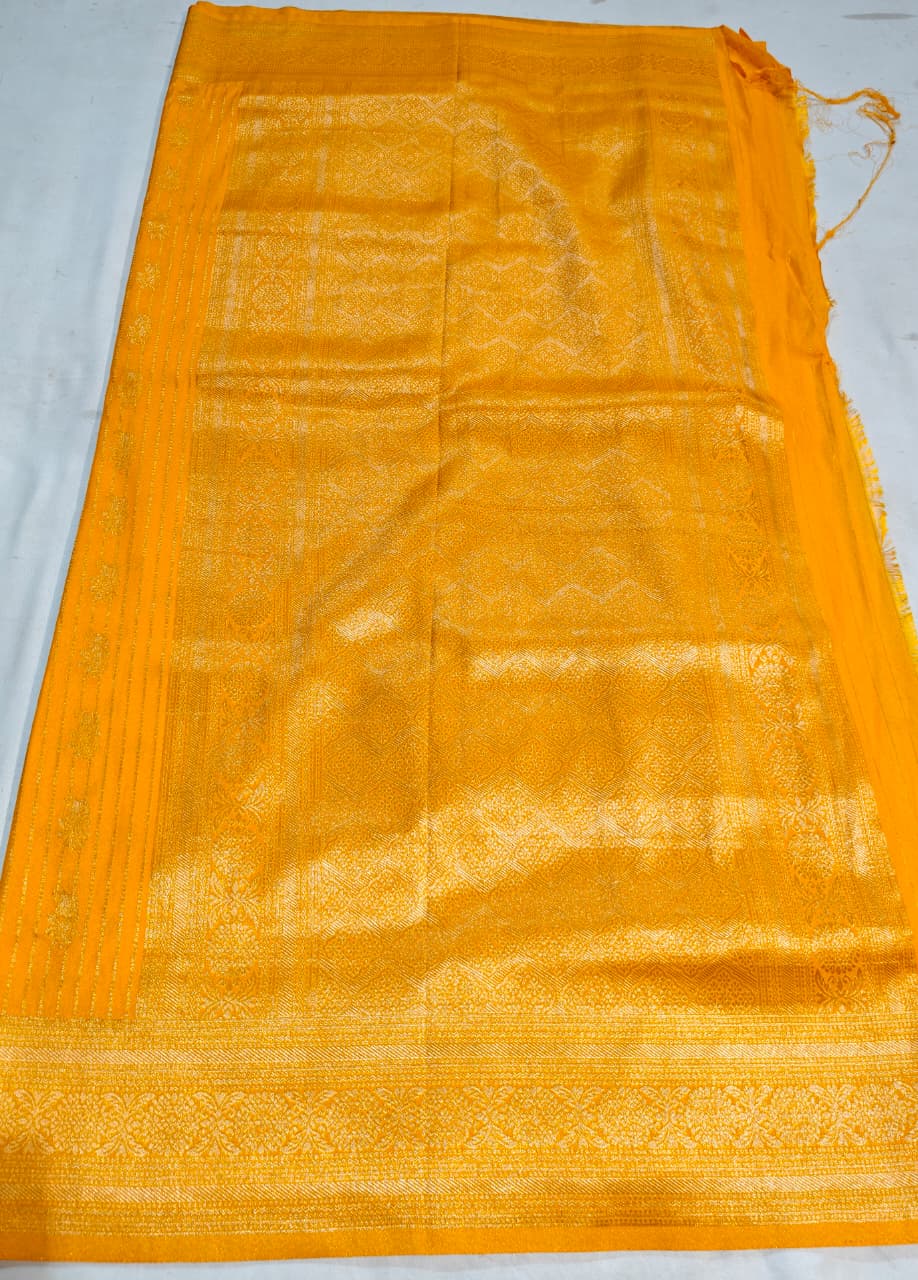 golden yellow banarasi georgette saree with classic zari weave