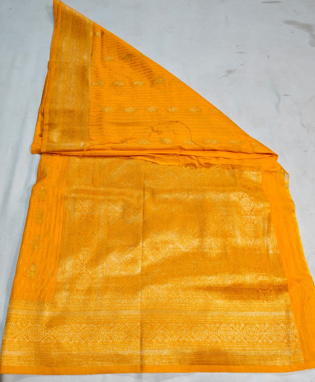 golden yellow banarasi georgette saree with classic zari weave