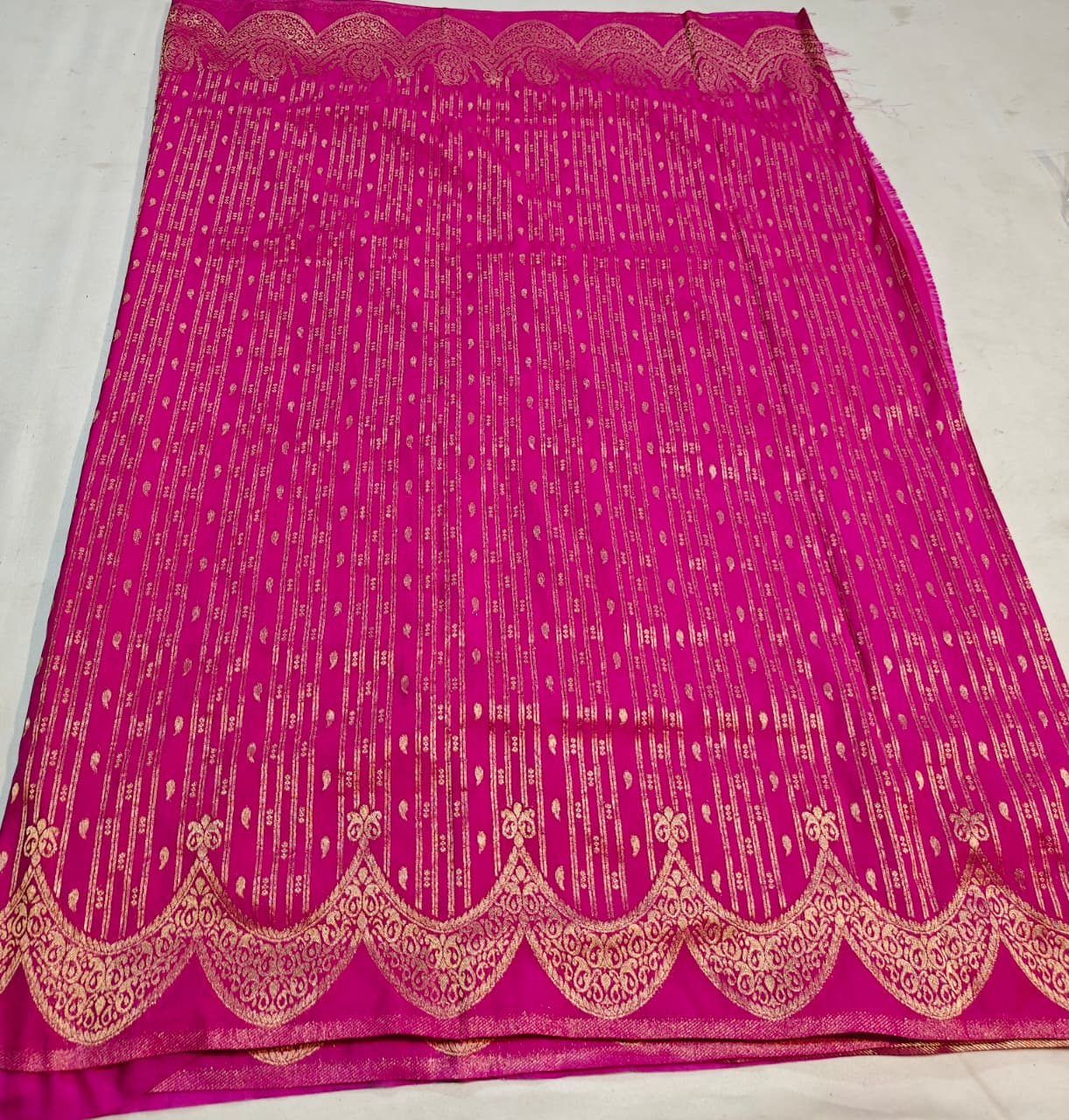 magenta banarasi georgette saree with ornate gold zari work