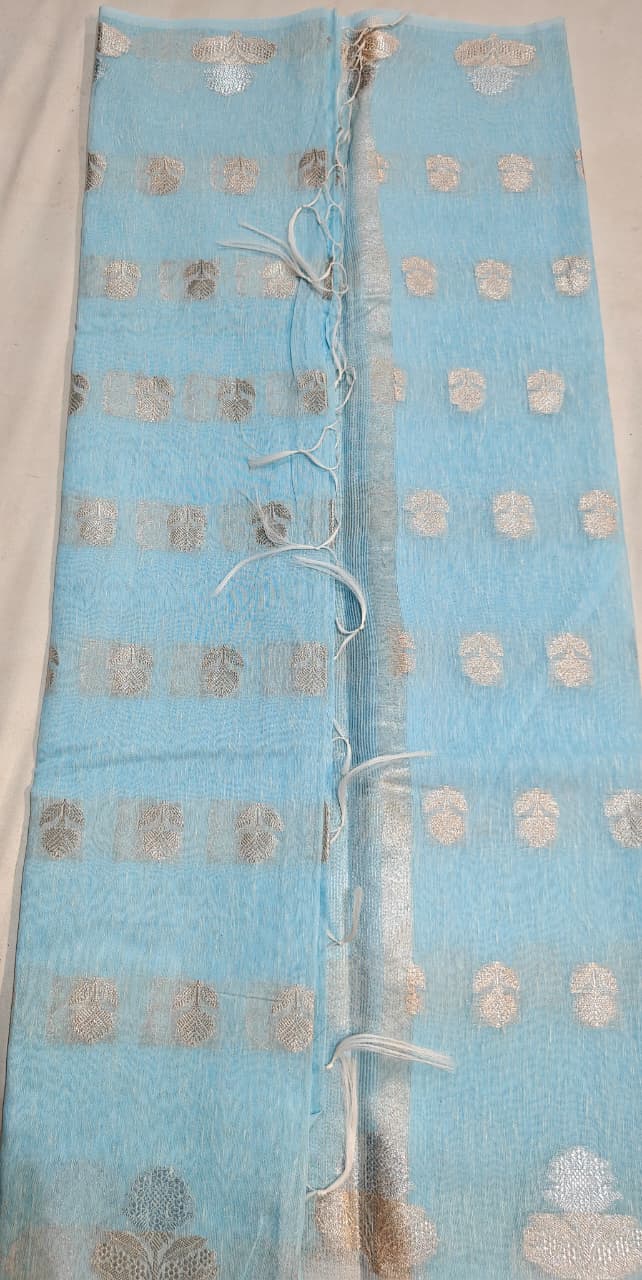 sky blue linen cotton saree with silver zari motifs