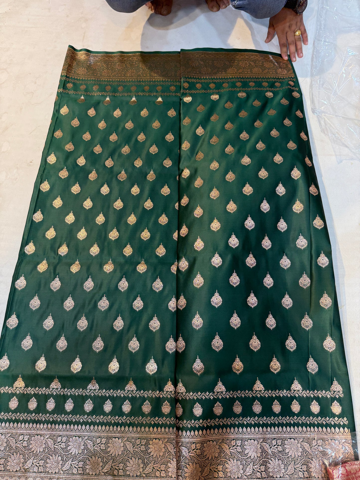 bottle green katan silk saree with banarasi zari paisley border and floral jaal