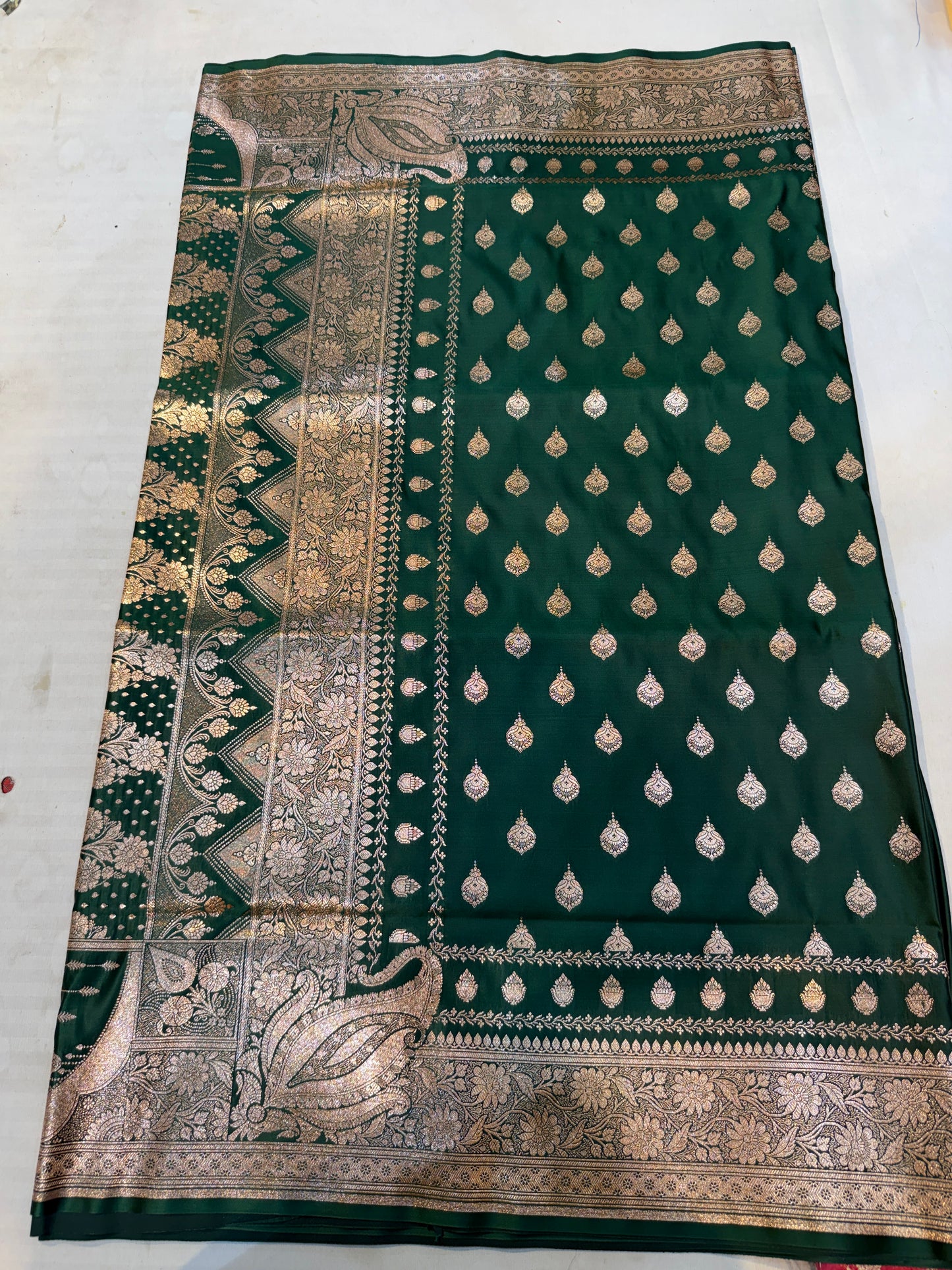 bottle green katan silk saree with banarasi zari paisley border and floral jaal